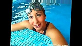 mature woman and guy in swimming pool